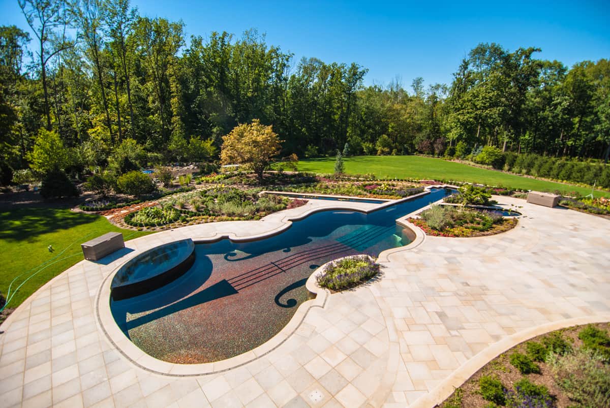 Custom swimming pool by cipriano landscape design beyond for Pool design garden