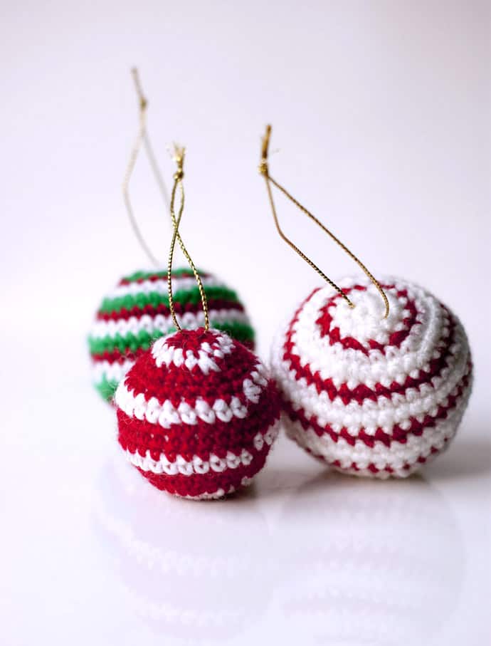 Styrofoam balls wrapped in crochet for snow bobbles. The red and white ...