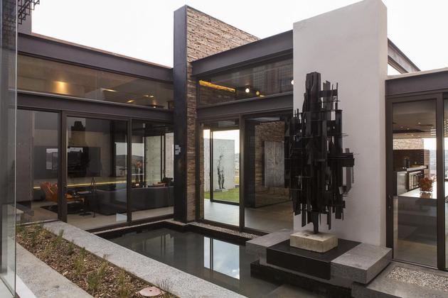 geometric-concrete-steel-home-stone-water-elements-12-sculpture.jpg