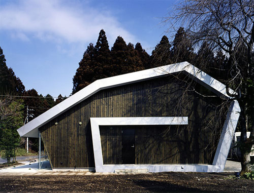 rolled-roof-house-1.jpg