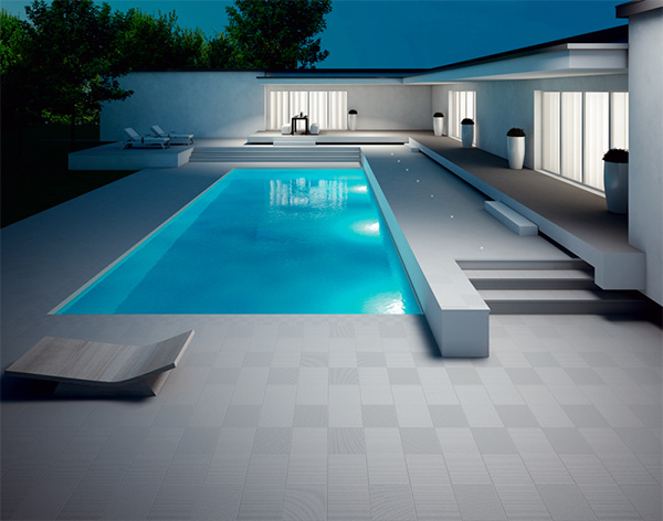 refin-outdoor-tile-x-stone-around-pool-application.jpg