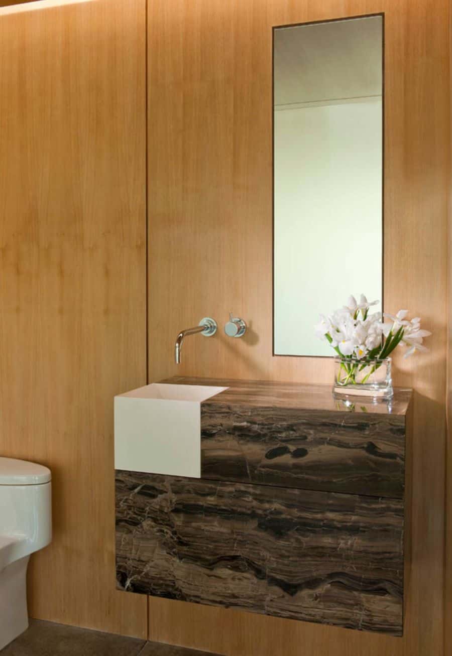 This sink is uniquely placed and adds to the room’s design.