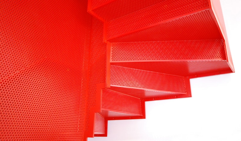 amazing bespoke red hot perforated steel suspended staircase diapo 11 craftsmanship