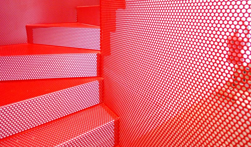 amazing bespoke red hot perforated steel suspended staircase diapo 6 balustrade