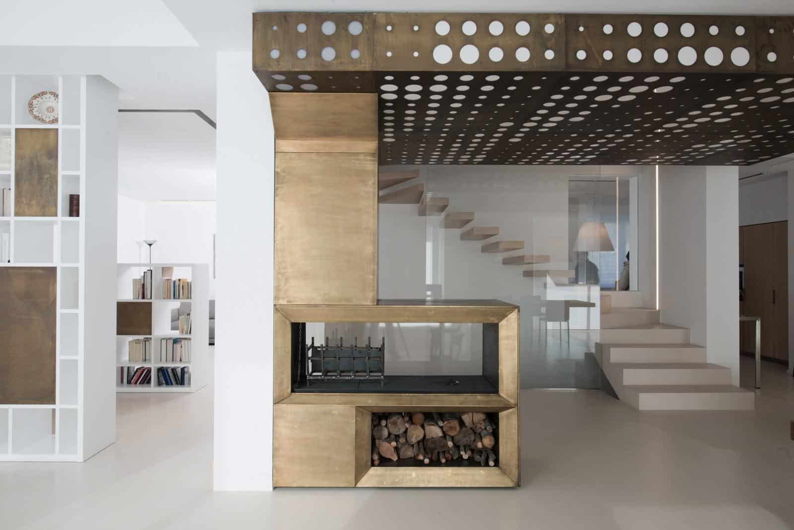 Burnished Brass Fireplace focus of Minimalist Home