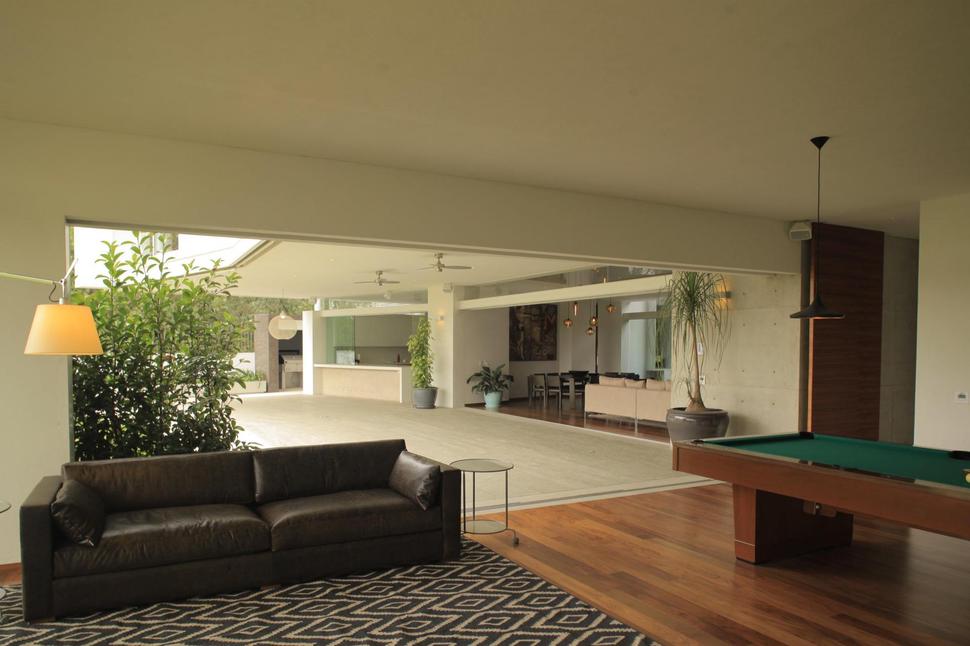 casa-siete-opens-wide-front-back-false-façade-14-games.jpg