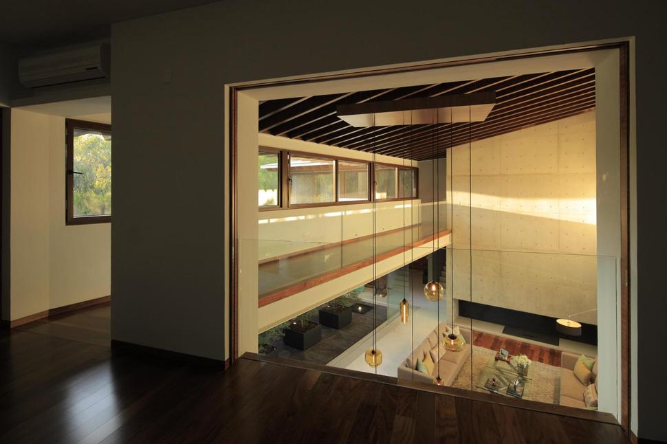 casa-siete-opens-wide-front-back-false-façade-20- mezzanine.jpg