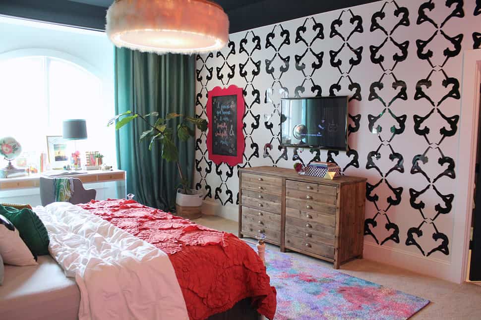 maximalist bedroom featuring green mirrored wall and dancers 2